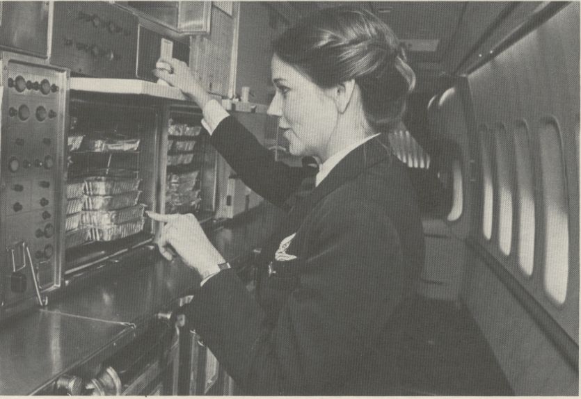 1981 A flight attendant performs a pre-departure galley check on a Pan Am Boeing 747SP.